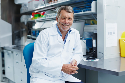 Portrait of smiling scientist in modern laboratory