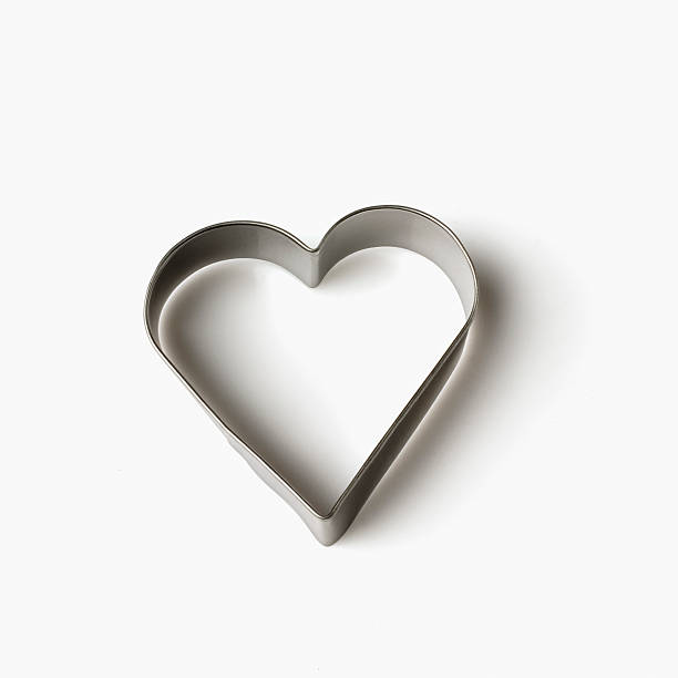 Close-up of a heart shaped pastry cutter stock photo