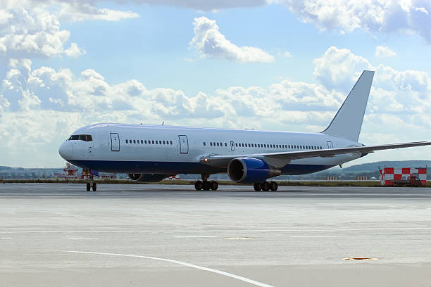 istock large passenger plane was taxiing for take-off in summer 487046580