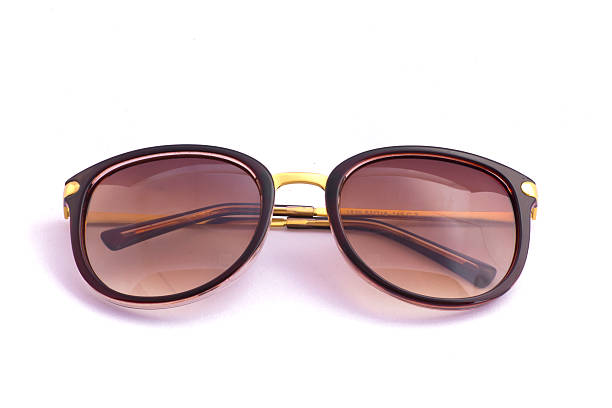 istock Brown sunglasses on isolated white background 487049941