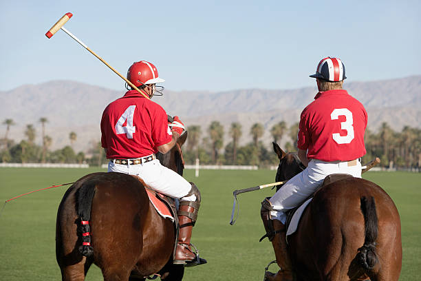 Polo Players Mounted On Horses