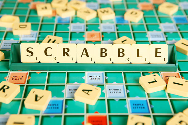 Scrabble Board Game Brisbane, Australia - April 26, 2014: Scrabble brand crossword game.  Copyright 2006 by Mattel, Inc.  Scrabble is a registered trademark of J.W. Spear and Sons. Ltd. word game stock pictures, royalty-free photos & images