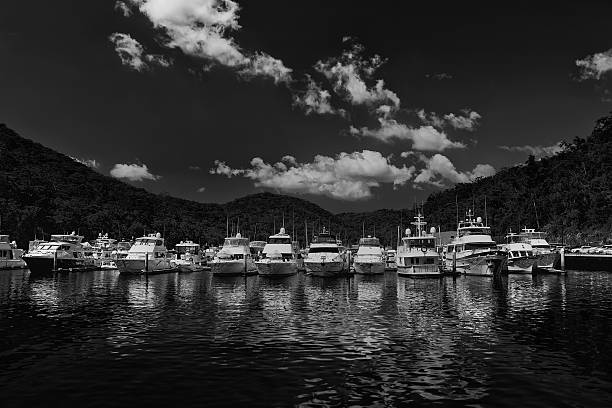 Bobbin Head,Australia - March 24,2013: Luxury cruisers moored at the marina on March 24,2013 in Bobbin Head, Australia. Winner of many awards, the marina provides berths, servicing and also hires fishing boats by the hour.