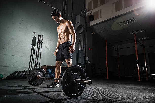 gym Training with a Barbell stock photo