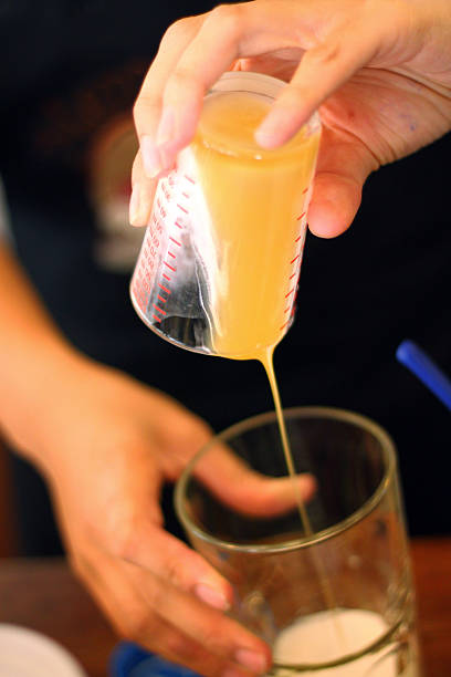 istock Barista pouring caramel syrup 487054704
