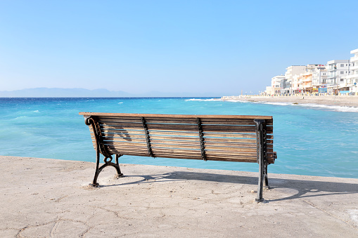 The bench on the waterfront in Rhodes, Rhodes Island, Greece