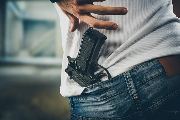 istock Man grabbing his pistol 487057262