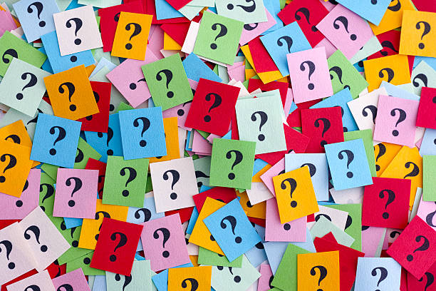 Too Many Questions Too Many Questions. Pile of colorful paper notes with question marks. Closeup. uncertainty photos stock pictures, royalty-free photos & images