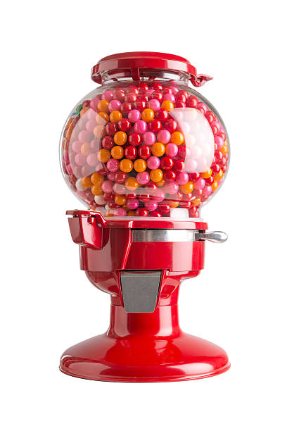 Bubble gum dispenser isolated on white background Bubble gum machine dispenser isolated on white background. Red, orange and pink candy gum vintage. vending machine photos stock pictures, royalty-free photos & images