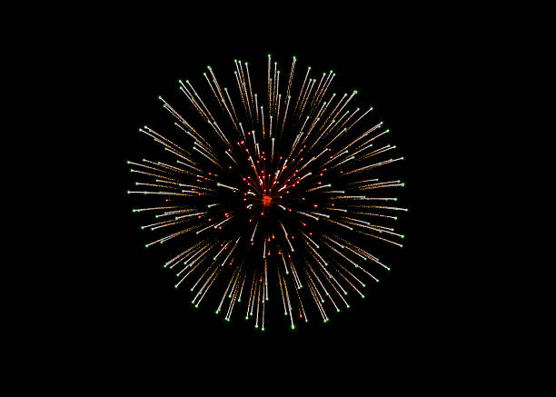 Fuochi d'artificio nel cielo scuro colorato - foto stock