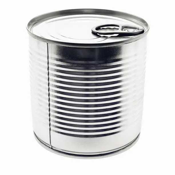 Tin food can with a blank label isolated on a white background.