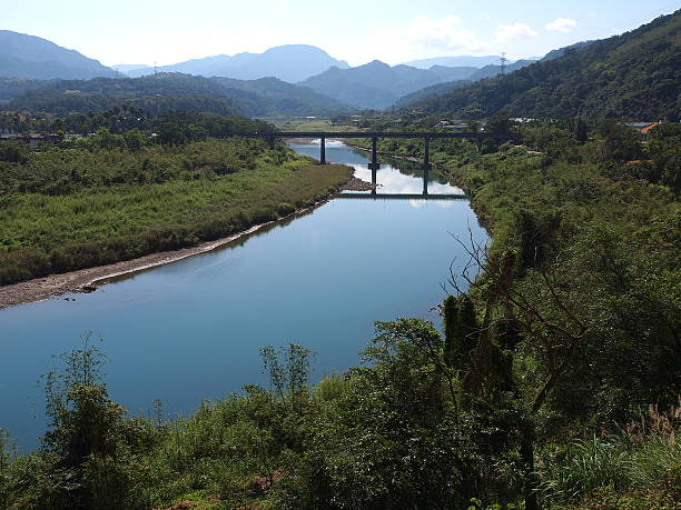 istock River, bridge, and blue sky in mountain 487075707