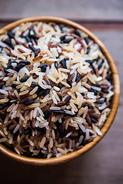 istock Rice in wood bowl 487076716
