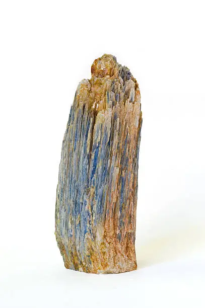 Museum piece isolated on white. Cyanite (also called Kyanite) is an aluminium silicate mineral.