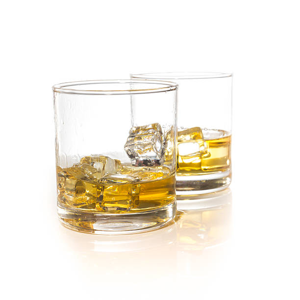 istock whiskey glasses with ice cubes isolated on white set collage 487078402