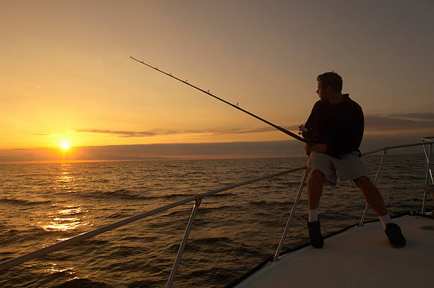 istock Sport Fisherman Watching Sun 487078485