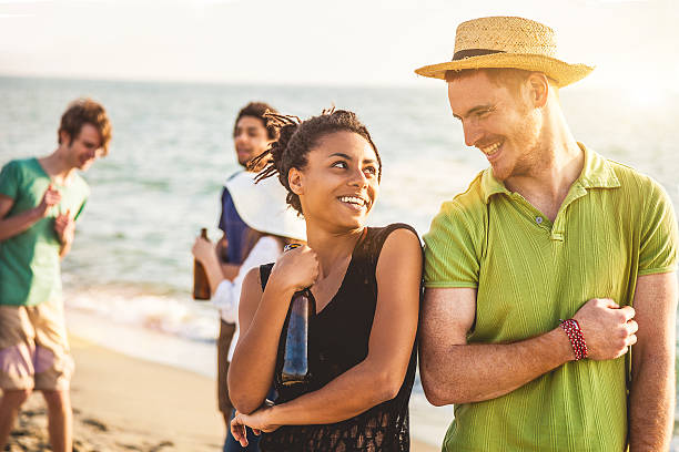 istock Group of multi-ethnic friends dancing on the beach 487079959