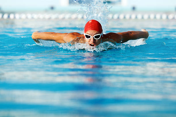 istock Man swimming butterfly stroke style 487080871