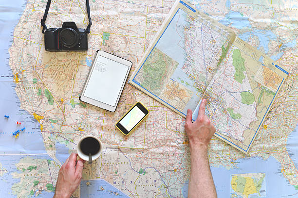 istock Young man planning a road trip 487081189