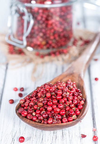 istock Cooking Spoon with Pink Peppercorns 487081567