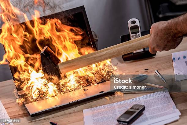 Close Up View Of Burning Laptop Stock Photo - Download Image Now - Laptop, Breaking, Demolishing