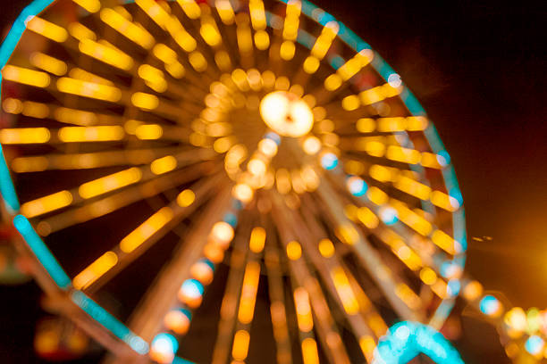 istock Defocused and blur image of Amusement park at night 487085420