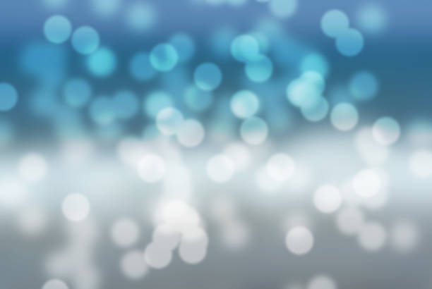 istock Shiny blue and white bokeh winter holidays background or pattern 487086066