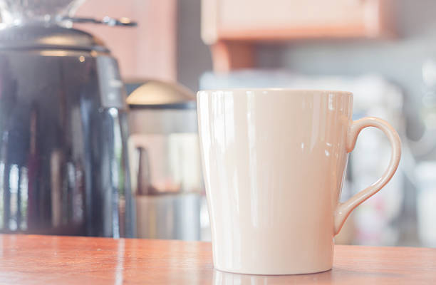 istock Coffee mug in coffee shop 487087912
