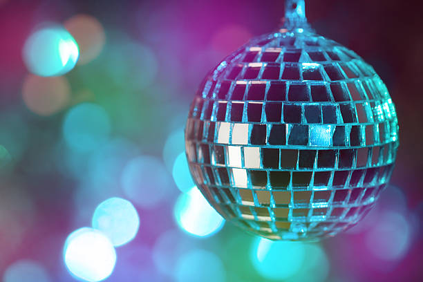 istock Colorful disco ball on bokeh background - horizontal 487091194
