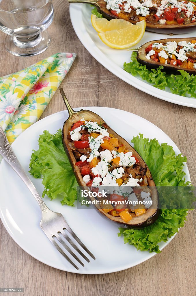Stuffed eggplant with vegetables Stuffed eggplant with ricotta and vegetables in lettuce 2015 Stock Photo