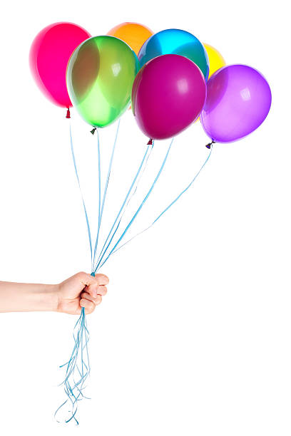 istock human hand gives flying balloons 487098025