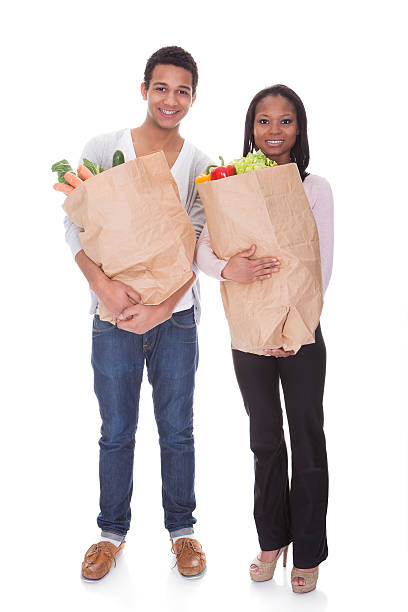 istock Couple With A Grocery Bag 487098887