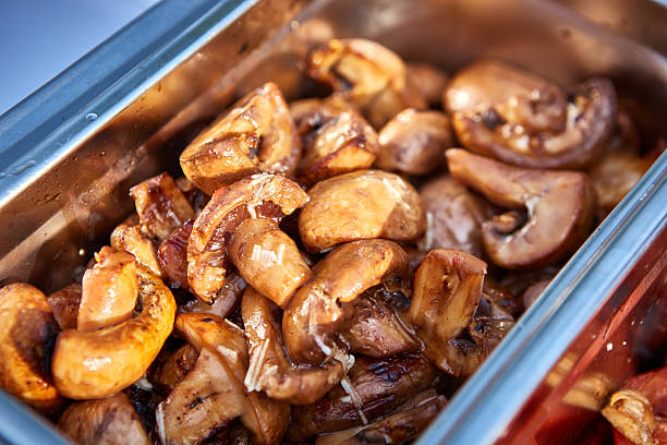 istock Cooking mushrooms on the grill 487099478