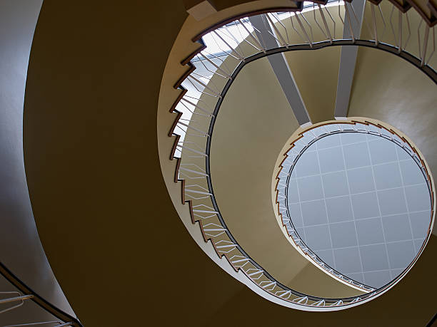 istock Upside view of a spiral staircase 487099636