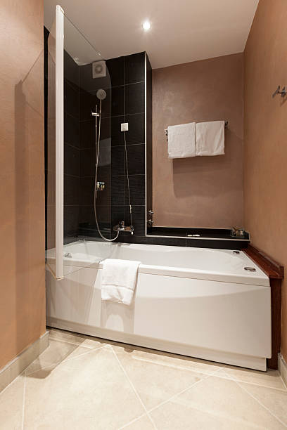istock Bath tub and shower in hotel 487099639