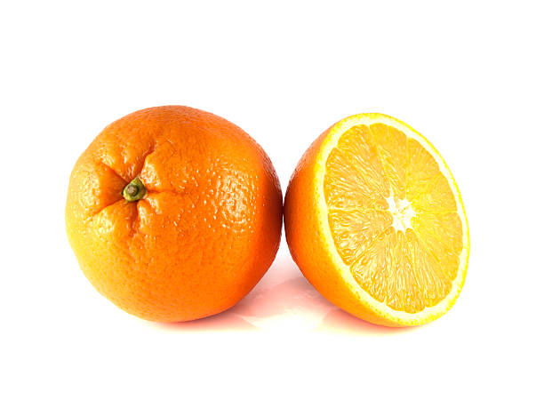 istock Ripe orange with sliced half isolated on white 487099707