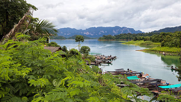 istock Landscape and long-tailed boat in Ratchaprapha Dam. 487099954