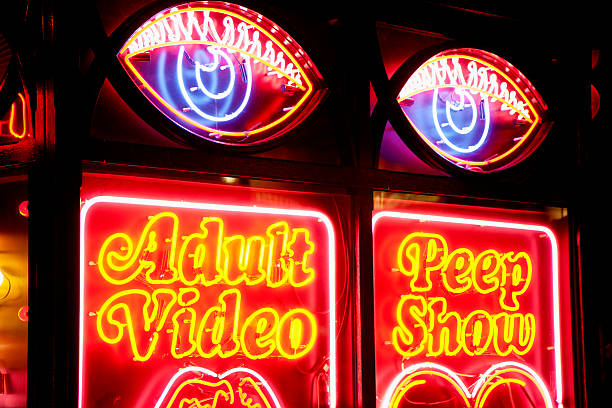Neon strip club sign stock photo