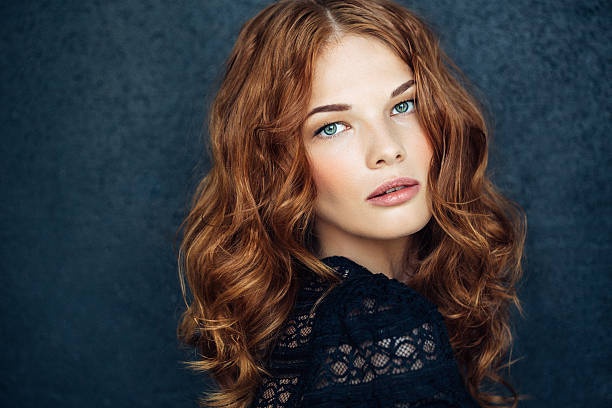 Young Beautiful Woman On Dark Background Stock Photo - Download Image Now -  Women, Redhead, Green Eyes - iStock