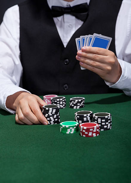 istock Poker player about to place a bet 487100802