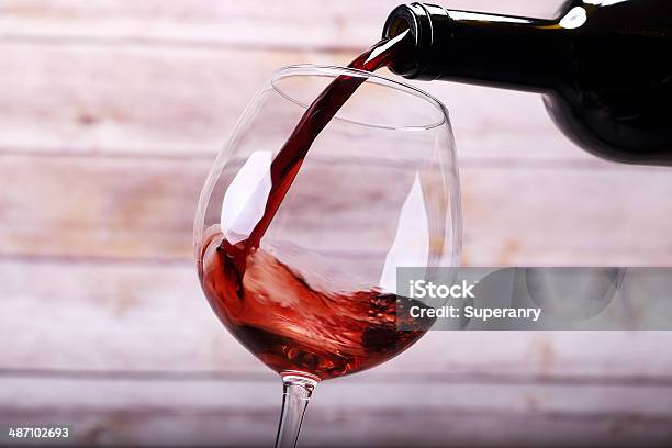 Pouring Wine Into Glass And Background Stock Photo - Download Image Now - Pouring, Red Wine, Backgrounds