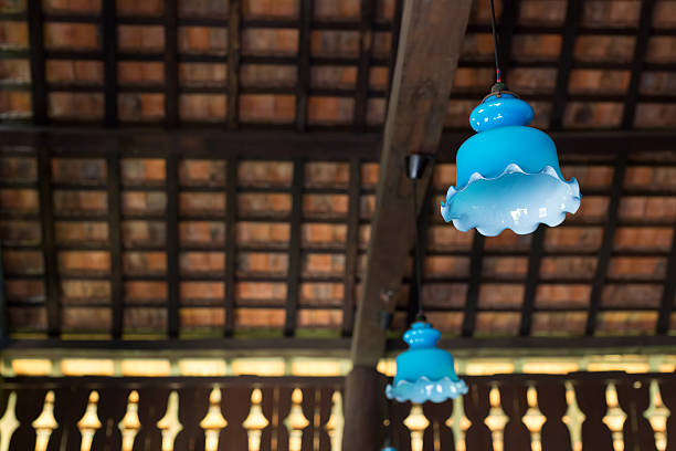 istock Hanging lantern and clay tiles roof 487103370