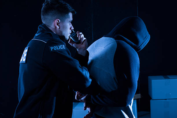 istock Policeman arresting law-breaker 487105176