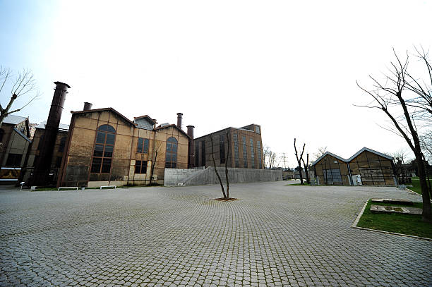 istock Old Factory and Empty parking lot 487105342