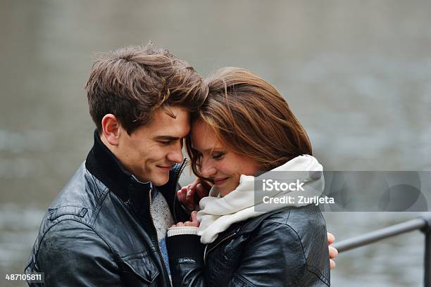 Lovely Couple Enjoying Fall In Love At Park Stock Photo - Download Image Now - 20-29 Years, Adult, Autumn