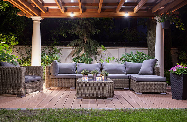 Modern patio at night Horizontal view of modern patio at night garden feature stock pictures, royalty-free photos & images