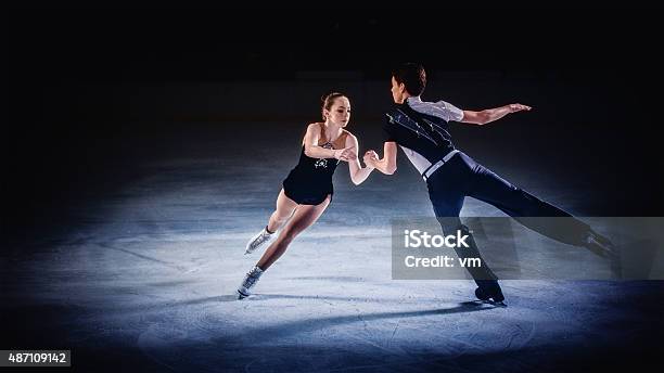 Figure Skating Pair Performing Stock Photo - Download Image Now - Figure Skating, Ice-skating, Two People
