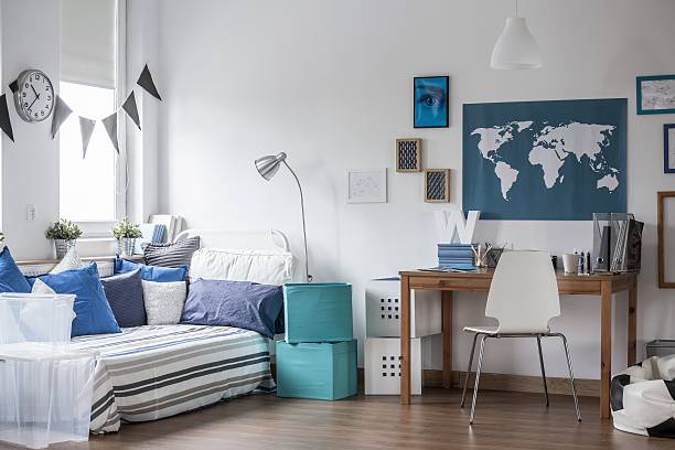 istock Teenage boy room design 487112232