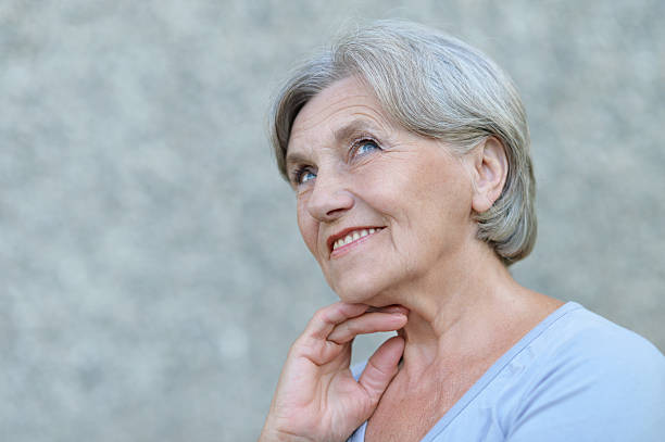 istock Smiling senior woman 487112266