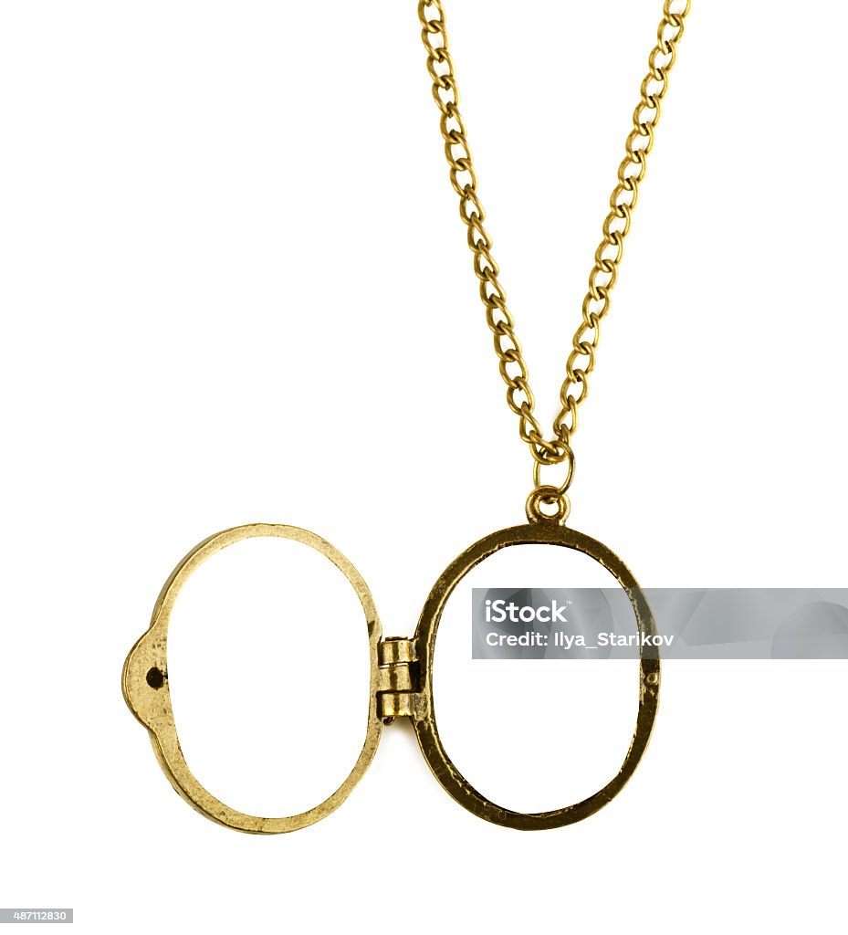 Brass locket Brass locket with chain on a white background Locket Stock Photo